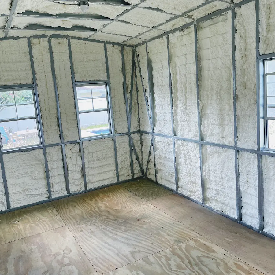 Closed-cell spray foam insulation applied to wall cavities in a residential project in Vincent
